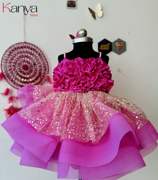 Dark pink outfit with fabric flower