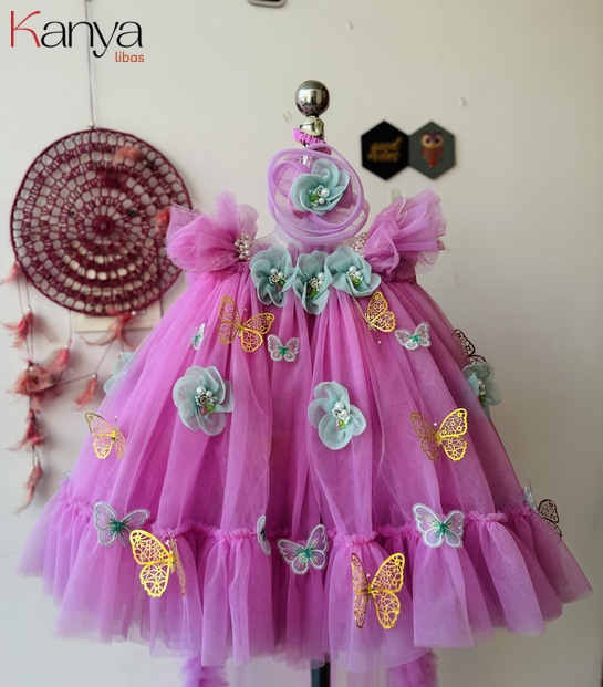 Pink outfit with hand made sea green flowers