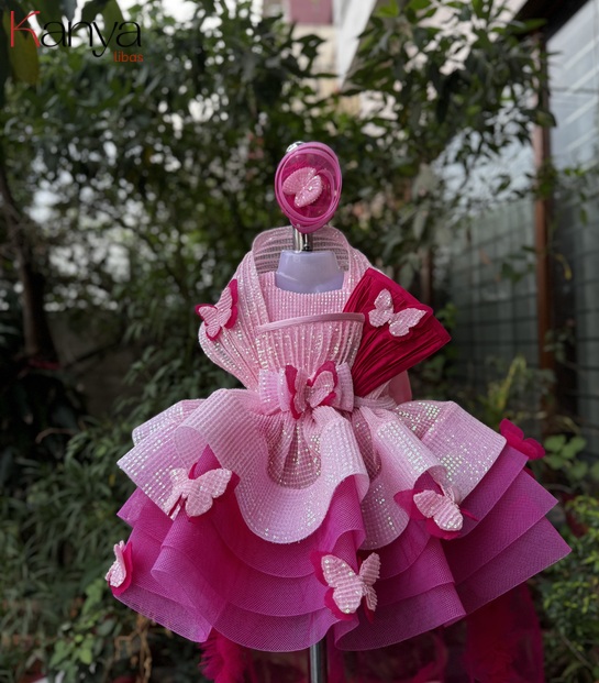 Pink contrast layered outfit with butterflies